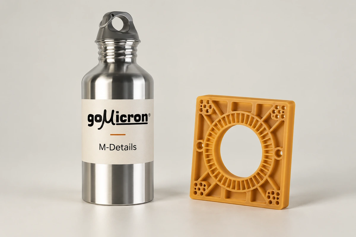 M-Details resin bottle beside an amber sample with fine ribs and intricate perforations